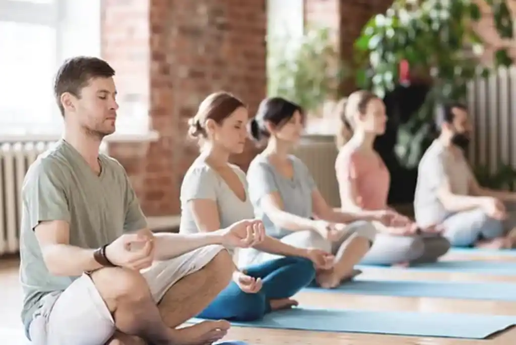 group of people meditating